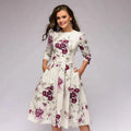 June | Women’s Printed Pleated Round Neck Flowy Knee Length Dress