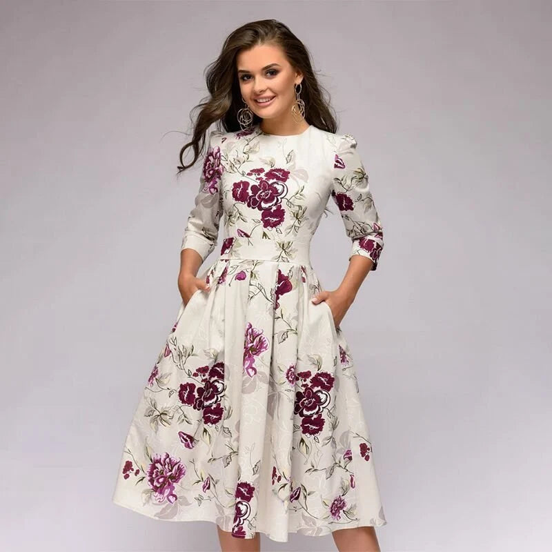 June | Women’s Printed Pleated Round Neck Flowy Knee Length Dress