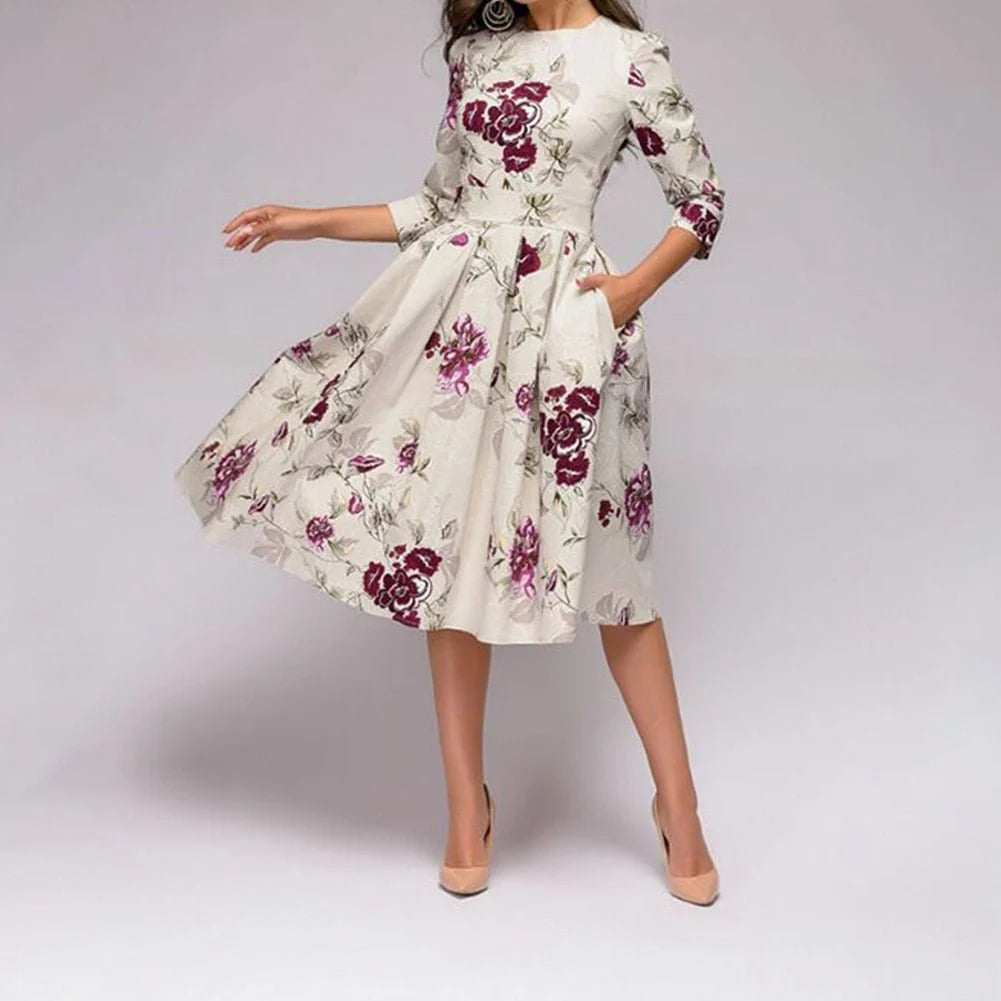 June | Women’s Printed Pleated Round Neck Flowy Knee Length Dress