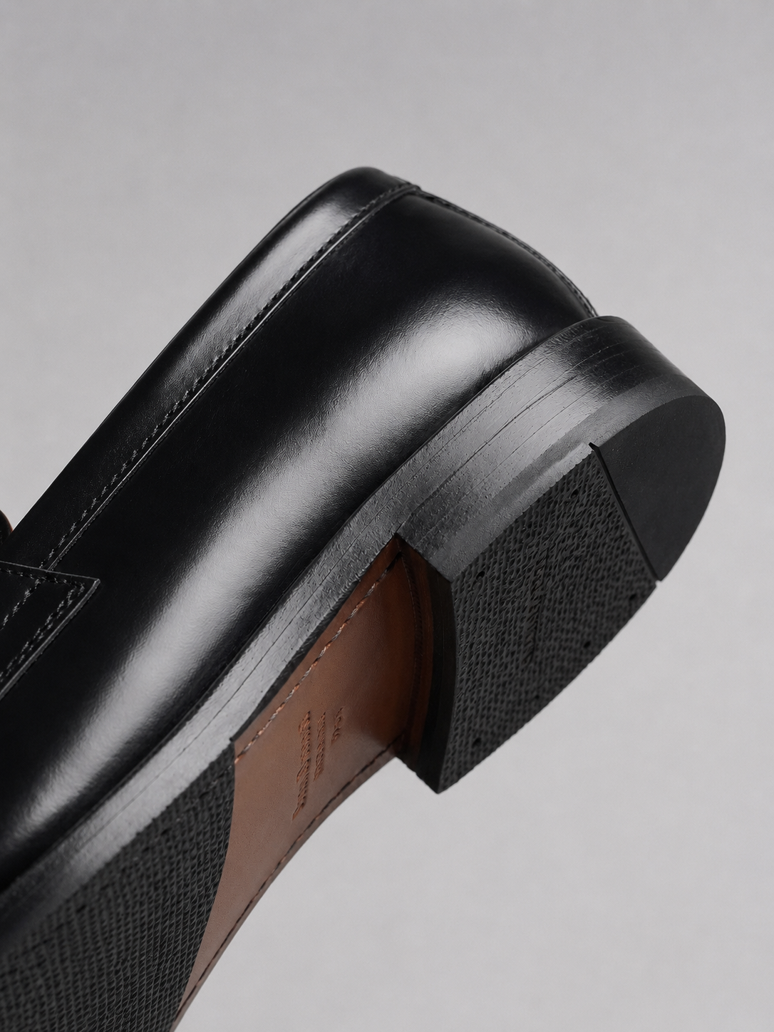 Men's Polished Faux Leather Penny Loafers in Black